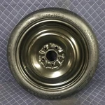 2002-12 Mitsubishi Eclipse Oem 16X4 Steel Wheel Goodyear Spare Tire T125/70D16. Fixed Price $110.25.