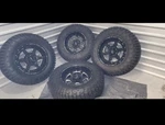 (4) Radar Renegade 37X12.50/R/20LT Tires On Weld Off-road Gloss Black Rims 6 Lug. Fixed Price $1620.00.
