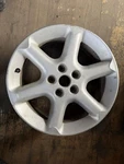 Wheel 17X7 Alloy 6 Spoke Natural Finish Fits 02-03 Maxima 581902. Fixed Price $135.00.