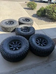 Nitto Ridge Grapplers /raceline Black Wheels - 37X13.50R18LT 6X5.5 6X139.7. Fixed Price $2500.00.
